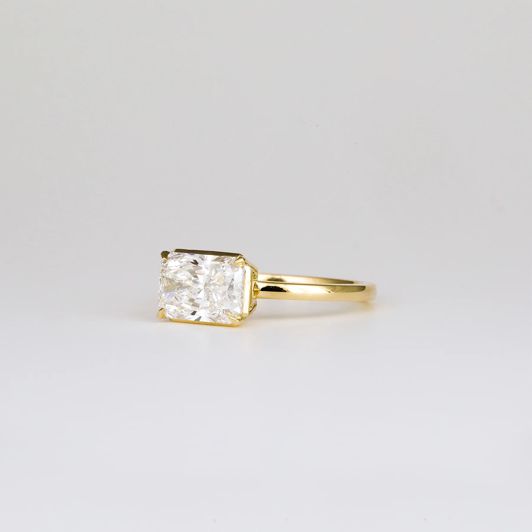 Aaren East-West Radiant Cut 2.01ct Lab Grown Diamond Solitaire Ring in Yellow Gold - Image 3